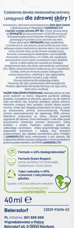 Sonnenschutz-Fluid Kontrolle dunkler Flecken